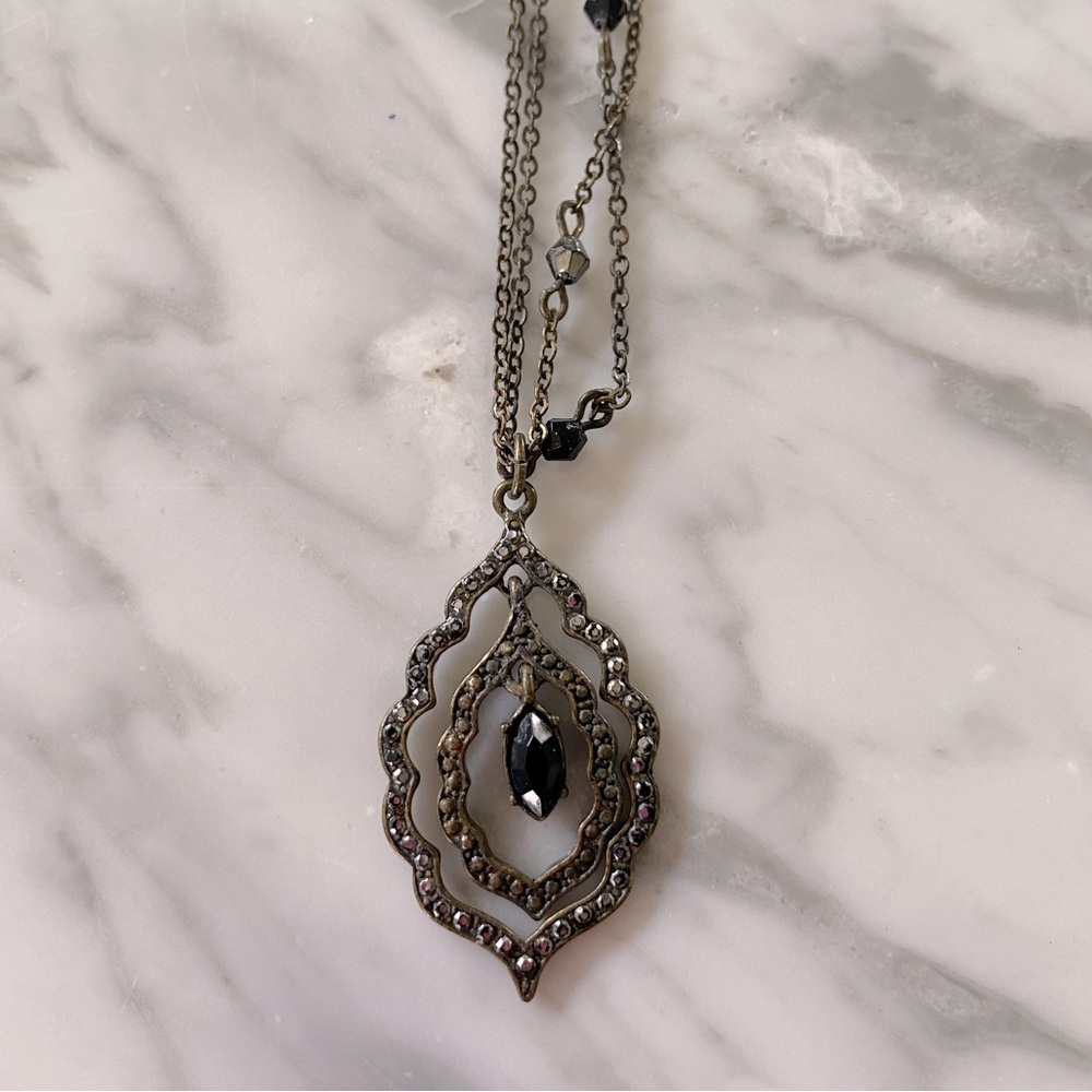 Black pendant necklace.